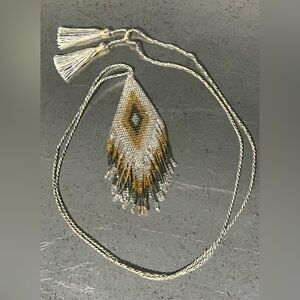 Elegant Gold and Silver Intricately Beaded Necklace